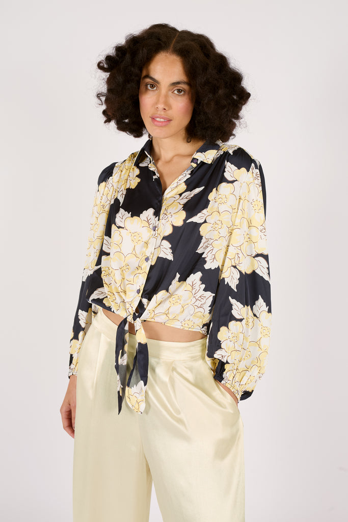 Another Close Up Front Model Shot of Navy Blue and Cream Floral Long Sleeve Tie Front Button Up Women's Blouse.