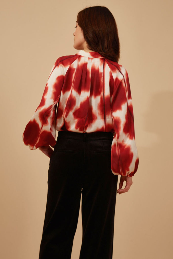 Red and White Print Tie Neck Long Sleeve Women's Blouse Close Up Back Model Shot