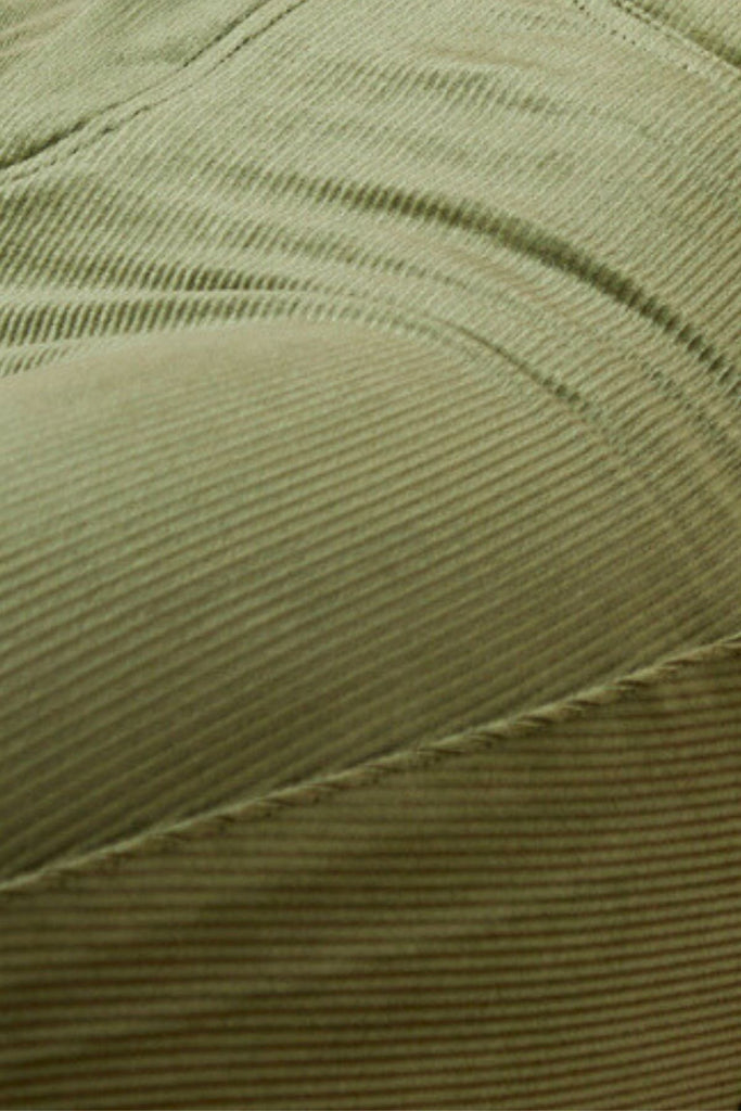 Close Up of Green Corduroy Women's Cropped Trousers Fabric