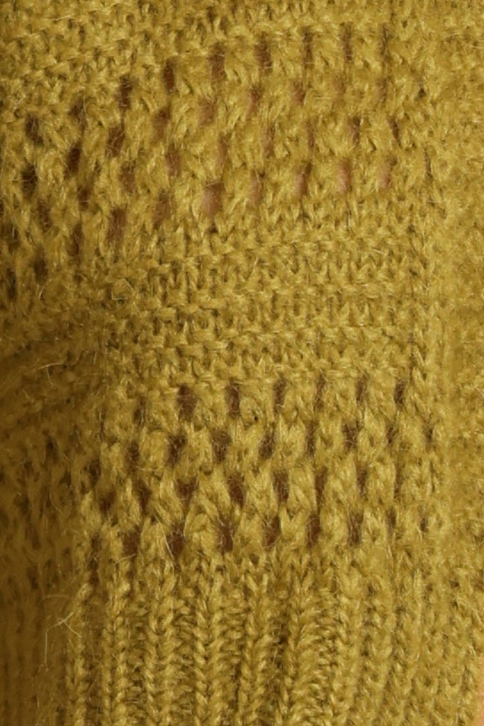 Swatch for green knitted cardigan fabric.