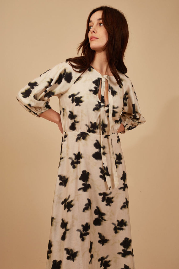 Cream and Black Print 3/4 Sleeve Tie Neck Midi Dress Close Up Front Model Shot 2