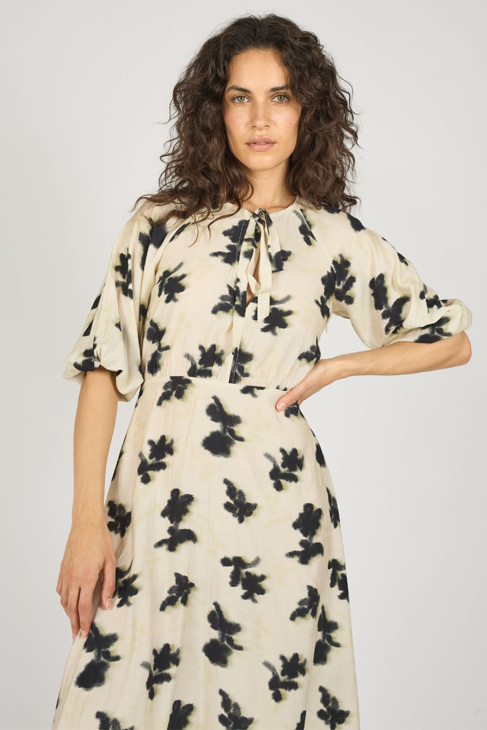 Cream and Black Print 3/4 Sleeve Tie Neck Midi Dress Close Up Front Model Shot