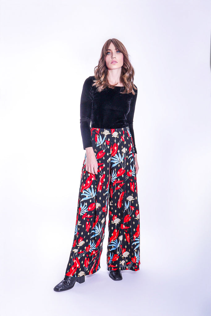 Traffic People Mustique Maggie Wide Leg Palazzo Trousers in Floral Print Back View Image