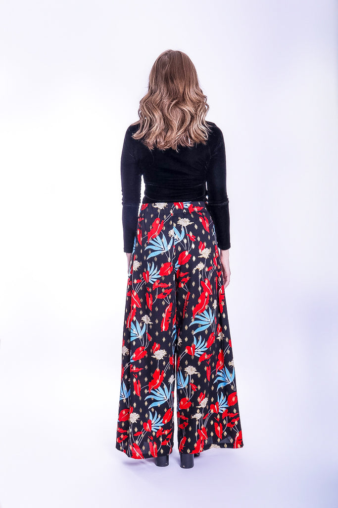 Traffic People Mustique Maggie Wide Leg Palazzo Trousers in Floral Print Close Up Image