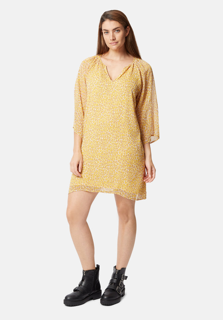Traffic People Moments Long Sleeve Animal Print Dress in Yellow Front View Image